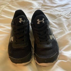 Black UA kids sneakers size 12.